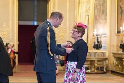 Ruth Perrott receives her MBE from Prince WIlliam